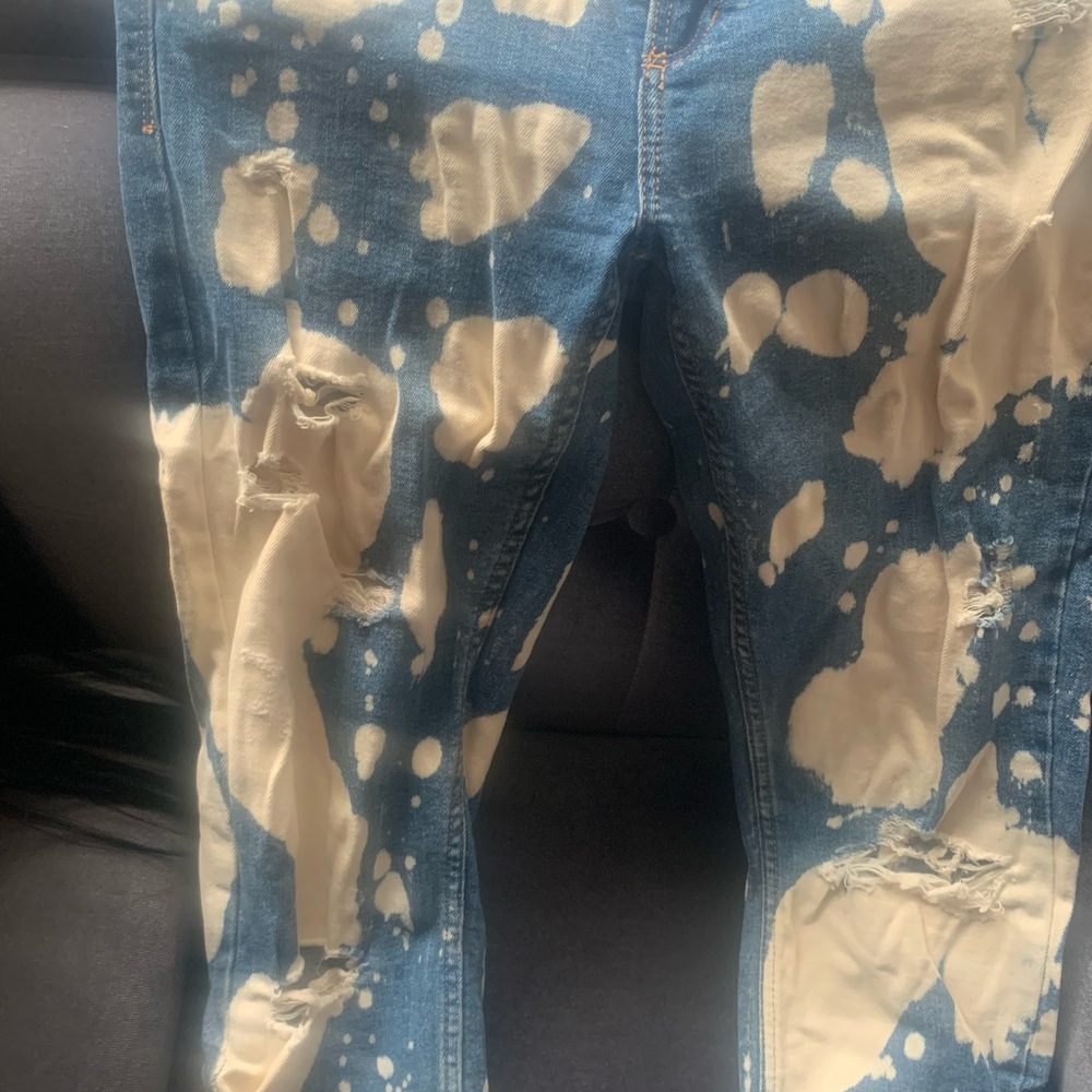 Bleach Print Denim Jeans with rips down legs can easily pair w fur vest or denim